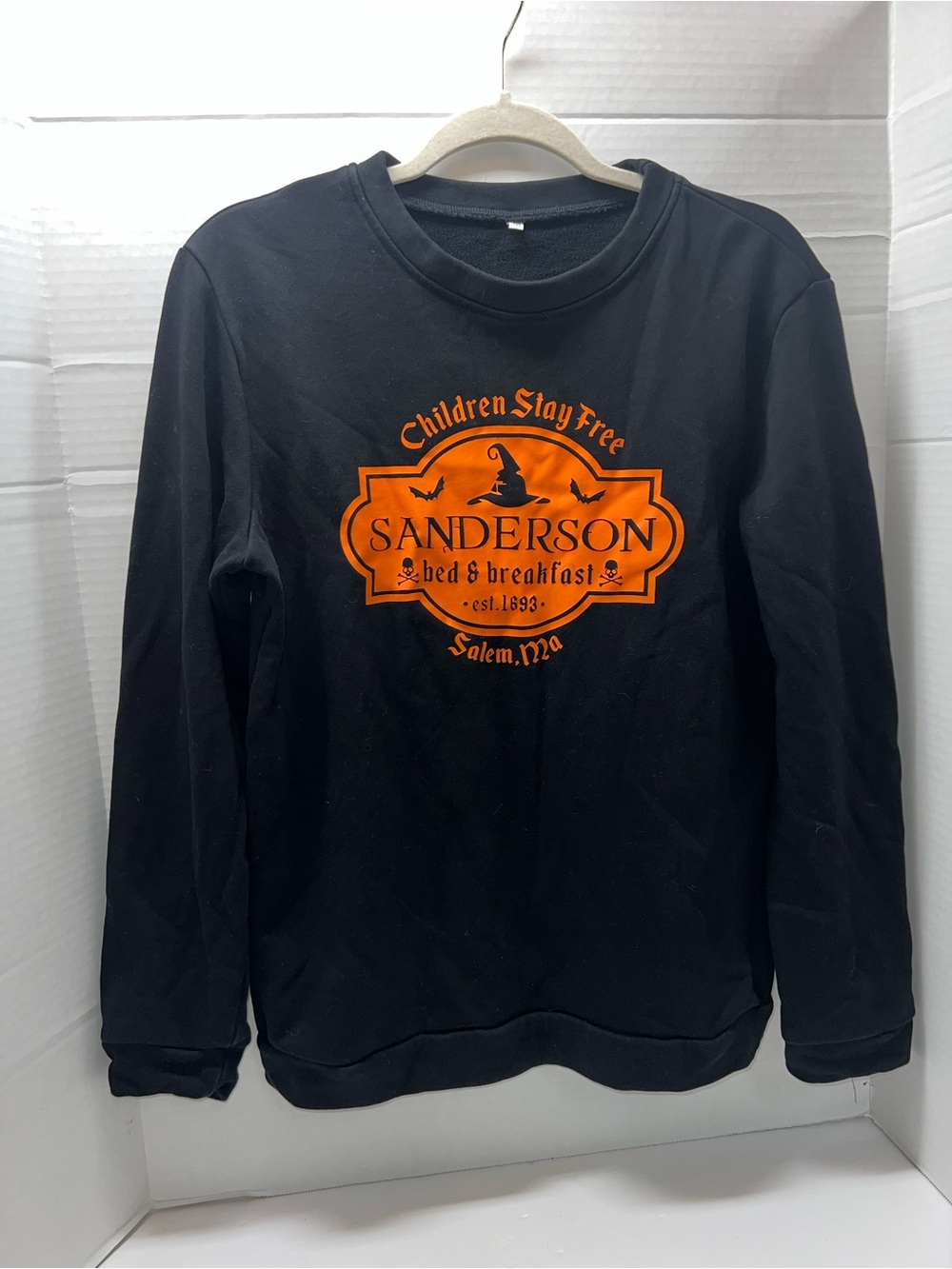 Sanderson Bed & Breakfast Black Halloween Sweatshirt with Orange Logo Salem